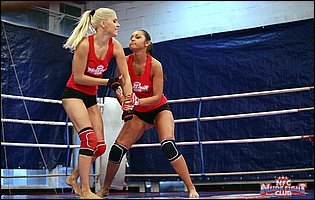 Hot wrestling match between Andrea Sultisz and Brandy Smile