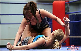 Hot wrestling match between Colette W and Demi C