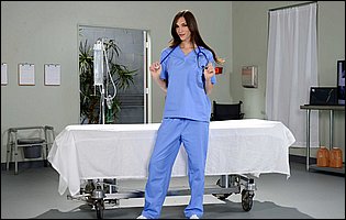Hot nurse Holly Michaels in stockings and heels strips for camera