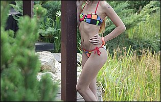 Bikini girl Mona Kim posing for your pleasure outdoor
