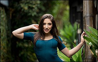 Abella Danger in sexy panties and black heels presents her body outdoor