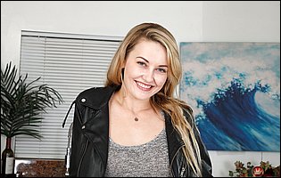 Cute blonde Adira Allure getting naked and spreading her pussy in kitchen