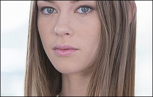 Flexible beauty Alexa Nova poses in black underwear and stockings