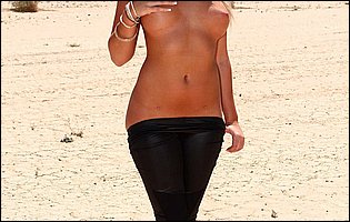 Alexis Monroe in black outfit strips and shows her sexy body outdoor