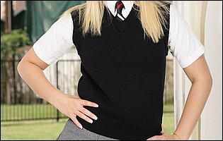 Alexis Texas in school uniform strips for camera