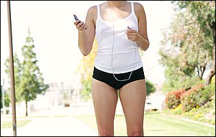 Sporty girl Allie Haze strips and poses outdoor