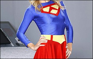 Supergirl Amanda Tate strips in front of the camera