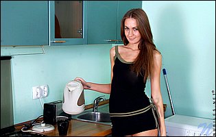 Angelic Anya stripping and posing naked in the kitchen