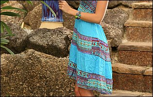 Anjelica in beautiful dress stripping and posing naked in the garden