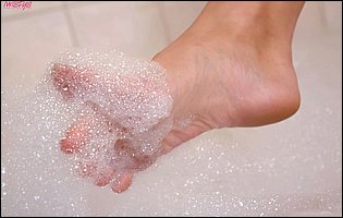 April O'Neil having fun in the tub