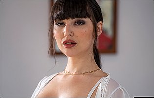 Aya Benetti in white lingerie and black boots teasing with hot body