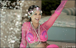 Bonnie Rotten in pink fishnet and stockings posing for your pleasure