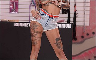 Bonnie Rotten strips off her red t-shirt and denim shorts