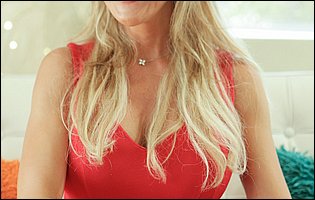 Brandi Love in red dress strips and shows off her fit body