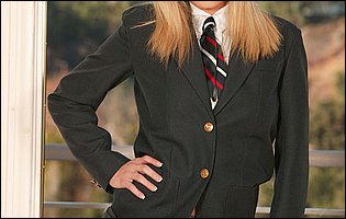 Bree Olson in school uniform strips for camera
