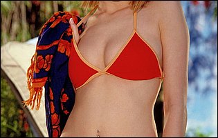 Sexy redhead Carli Banks exhibits her body
