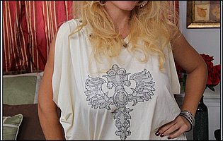 Hot MILF Charlee Chase stripping and posing in front of the camera
