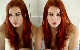 Sexy redhead Charlie Red posing for you in the bathroom