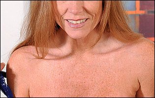 Busty mature lady Darla Crane fucking her pussy with glass dildo
