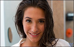 Eva Lovia posing for your pleasure in the bathroom