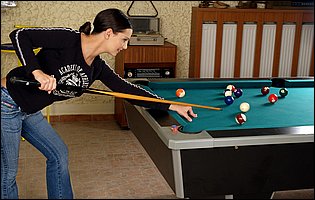 Eve Angel strips and plays with a dildo on pool table