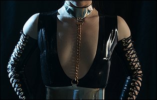 Evelyn Claire and Joanna Angel in black fetish latex outfit posing for camera
