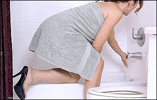 Beautiful MILF Jacqueline Rose masturbating in the shower