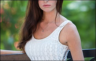 Jayden Taylors in sexy white dress posing outdoor