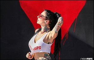 Joanna Angel in sexy top and red panties likes teasing
