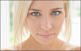 Gorgeous blonde Kacey Jordan showing off her tight body and pink pussy