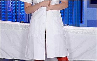Hot nurse Kagney Linn Karter in red stockings poses for camera
