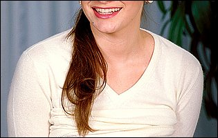 Gorgeous busty brunette Karen Wellington getting nude