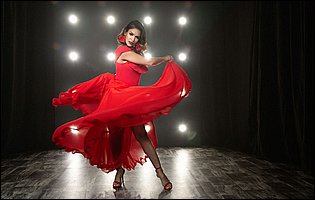 Gorgeous lady Katana Kombat posing in sexy red outfit and heels