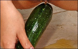 Katarina Sidney fucks her pussy with a cucumber