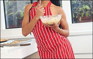 Beautiful cook Kira Noir posing for you in kitchen