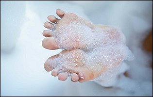 Layla Sin showing off her hot body and nice feet in the bathroom