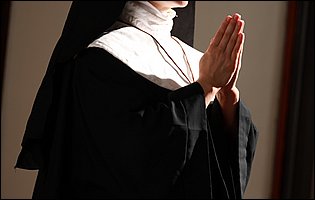 Sexy nun Lea Lexus strips for camera