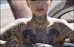 Wild beauty Leigh Raven teasing with tight body