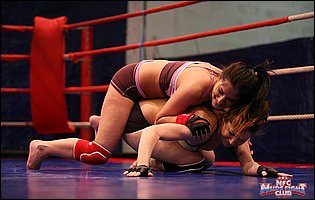 Hot wrestling match between Lexy Little and Nicole Sweet