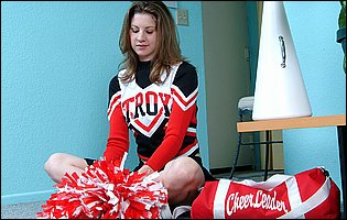 Beautiful cheerleader Lisa Marie stripping for camera