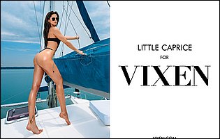Beautiful brunette Little Caprice posing on yacht