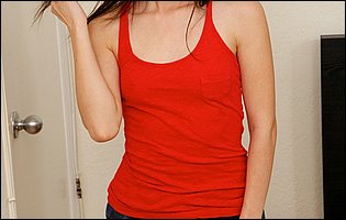 Lucie Cline in red t-shirt posing and fingering her pussy