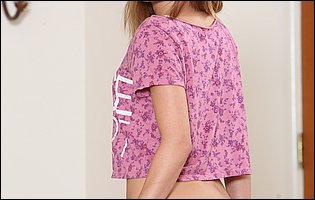 Maci Winslett strips off her pink t-shirt, denim shorts and white underwear