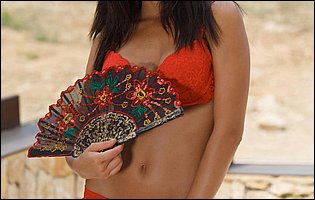 Gorgeous brunette Michaela Isizzu posing for your pleasure outdoor