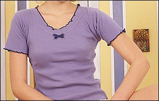 Lovely teen Monica Sweet posing and playing with a dildo