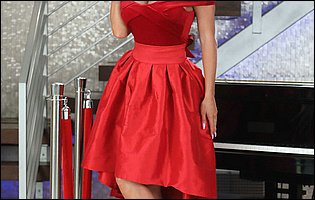 Classy lady Nicolette Shea strips her red dress