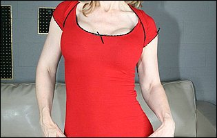 Nina Hartley strips off her short red dress and pantyhose