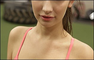 Cute sporty girl Olivia Nova strips in the gym