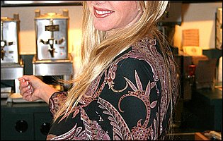 Hot busty blonde Penny Porsche poses for camera