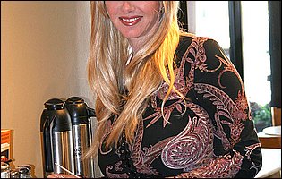 Hot busty blonde Penny Porsche poses for camera